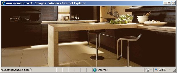 SieMatic-Bildergalerie mit dunkler Küche und Kochinsel